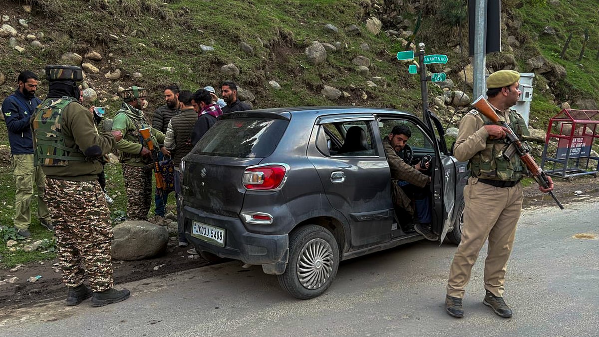 -PTI : Commuters undergo security checks after terrorists attacked a group of tourists at Pahalgam, in Anantnag district, Jammu & Kashmir, Tuesday, April 22, 2025. At least 12 people suffered injuries in the attack, according to officials. 
