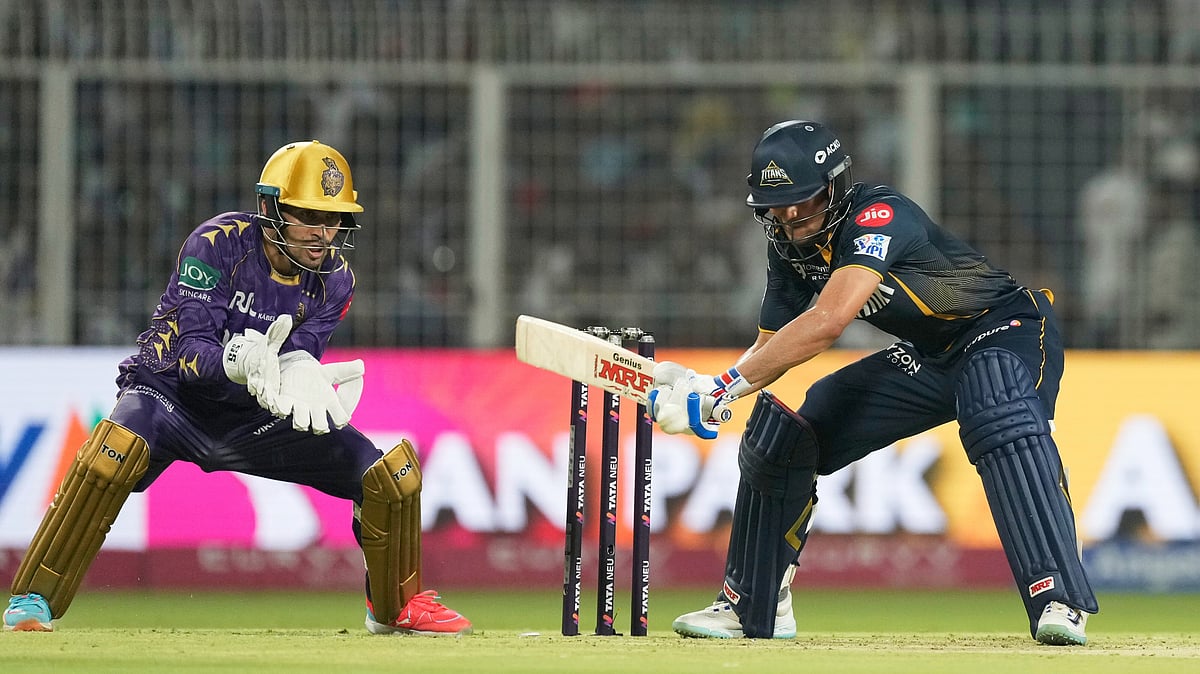 AP Photo/Bikas Das : Gujarat Titans' captain Shubman Gill plays a shot during the Indian Premier League cricket match between Kolkata Knight Riders and Gujarat Titans at Eden Gardens in Kolkata.