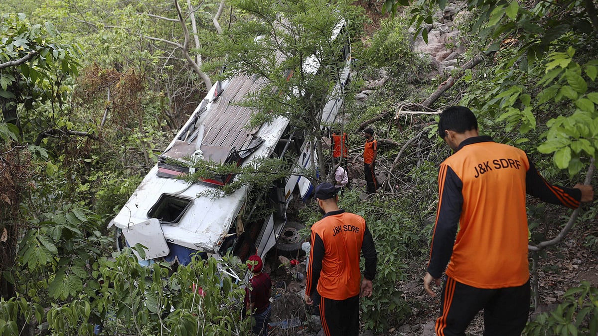 Rescue team members near the tourist bus targetting in Reasi district, Jammu and Kashmir - | Photo: PTI