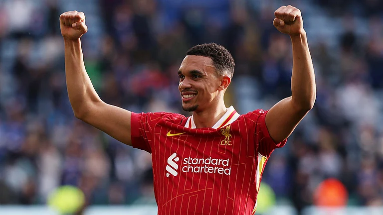 Trent Alexander-Arnold celebrates Liverpool's win over Leicester City - File
