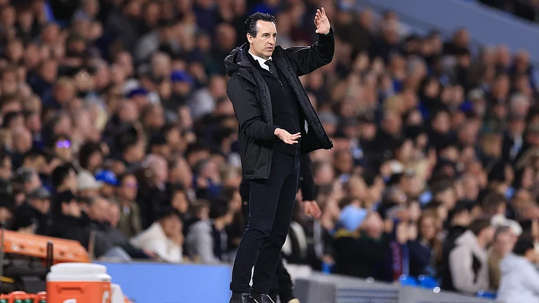 Unai Emery on the touchline against Manchester City. - File