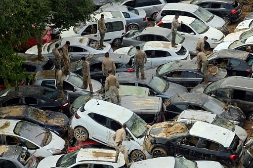 AFP : Soldiers search wrecked cars after flooding in Valencia, Spain, on November 8, 2024
