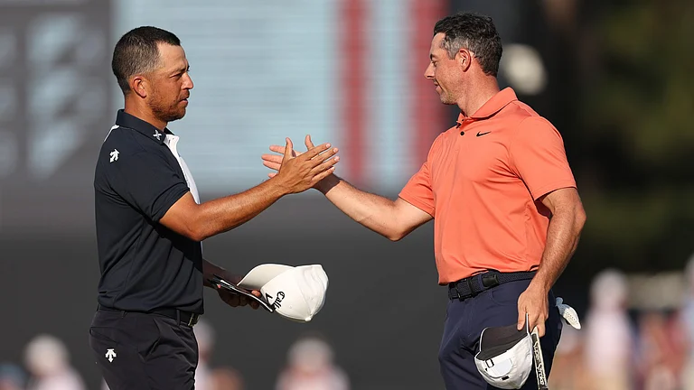 Xander Schauffele and Rory McIlroy - null