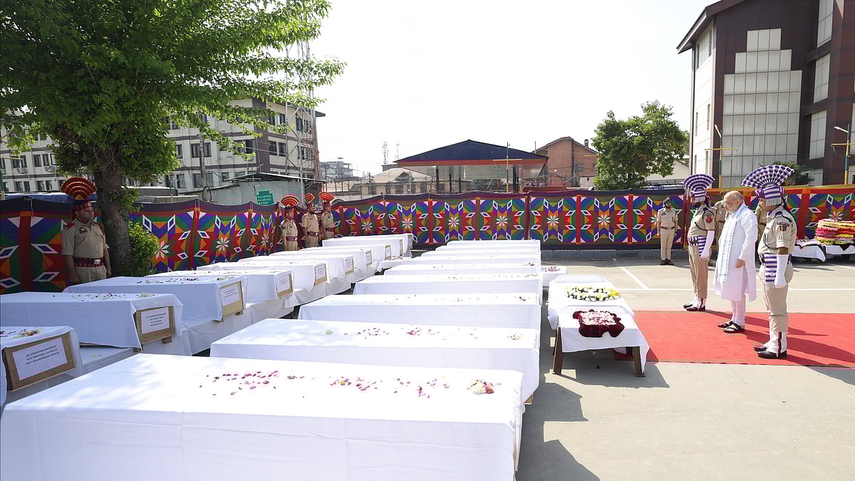 Photo: X | Amit Shah : Union Minister of Home Affairs of India, Amit Shah, paying last respects to the deceased of the Pahalgam terror attack.