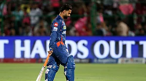 AP Photo/Surjeet Yadav : Lucknow Super Giants' captain Rishabh Pant walks off the field after losing his wicket during the Indian Premier League cricket match between Lucknow Super Giants and Rajasthan Royals at Sawai Mansingh Stadium in Jaipur.