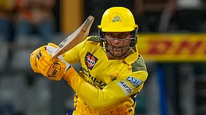 AP Photo/Rajanish Kakade : Chennai Super Kings' Rachin Ravindra play a shot during the Indian Premier League cricket match between Mumbai Indians and Chennai Super Kings at Wankhede Stadium in Mumbai.