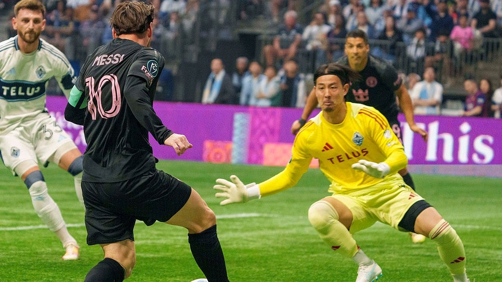 Christopher Morris/The Canadian Press via AP : Inter Miami's Lionel Messi, front left, shoots against Vancouver Whitecaps goalkeeper Yohei Takaoka, front right, during the first half of a CONCACAF Champions Cup semifinal soccer match in Vancouver, British Columbia, Thursday, April 24, 2025.