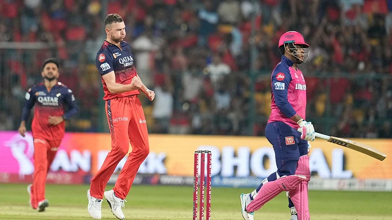Josh Hazlewood celebrates.