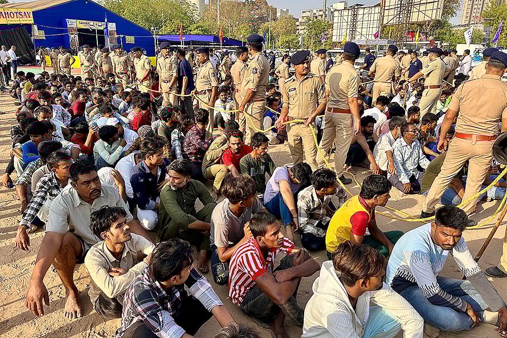 | Photo: PTI : Immigrants detained in Ahmedabad