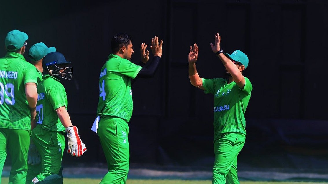 X/cricketsaudi : Saudi Arabia players celebrate.