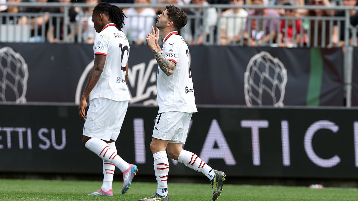 Christian Pulisic celebrates after scoring Milan's first goal