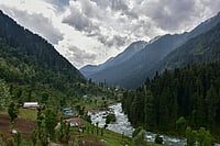 SOPA Images : In the shadow of the Himalayas, a hidden valley in Kashmir draws waves of Israeli backpackers, spiritual seekers, and those chasing a whisper of ancient connections—between Moses, meadows, and myths