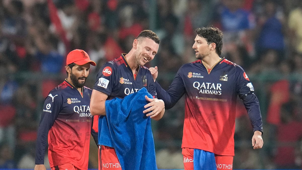AP Photo/Aijaz Rahi : Royal Challengers Bengaluru's Josh Hazlewood celebrates the dismissal of Rajasthan Royals' Dhruv Jurel during the Indian Premier League cricket match in Bengaluru.