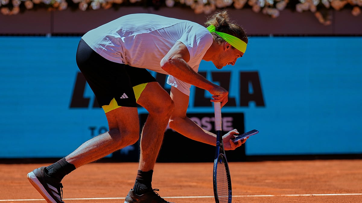 (AP Photo/Manu Fernandez)

 : Alexander Zverev of Germany takes a picture with his phone during his Madrid Open round of 32 tennis match against Alejandro Davidovich Fokina of Spain, in Madrid, Spain, Sunday, April 27, 2025. 
