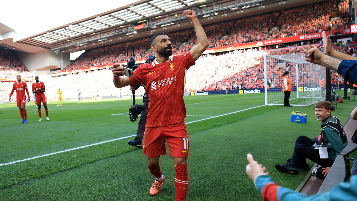 Mohamed Salah takes a selfie after scoring Liverpools fourth goal