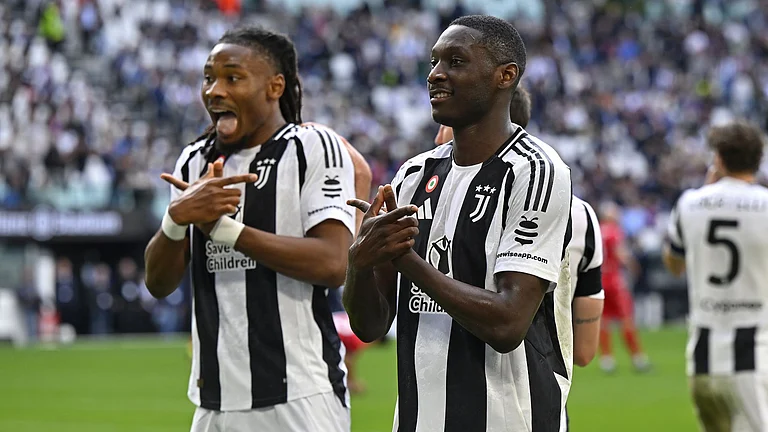 Thuram and Kolo Muani celebrate Juventus' second goal - null
