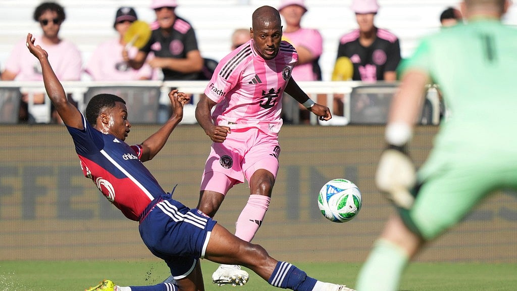 Photo: AP : FC Dallas midfielder Kaick Ferreira, left, clears the ball away from Inter Miami midfielder Fafà Picault (7) during their MLS match.