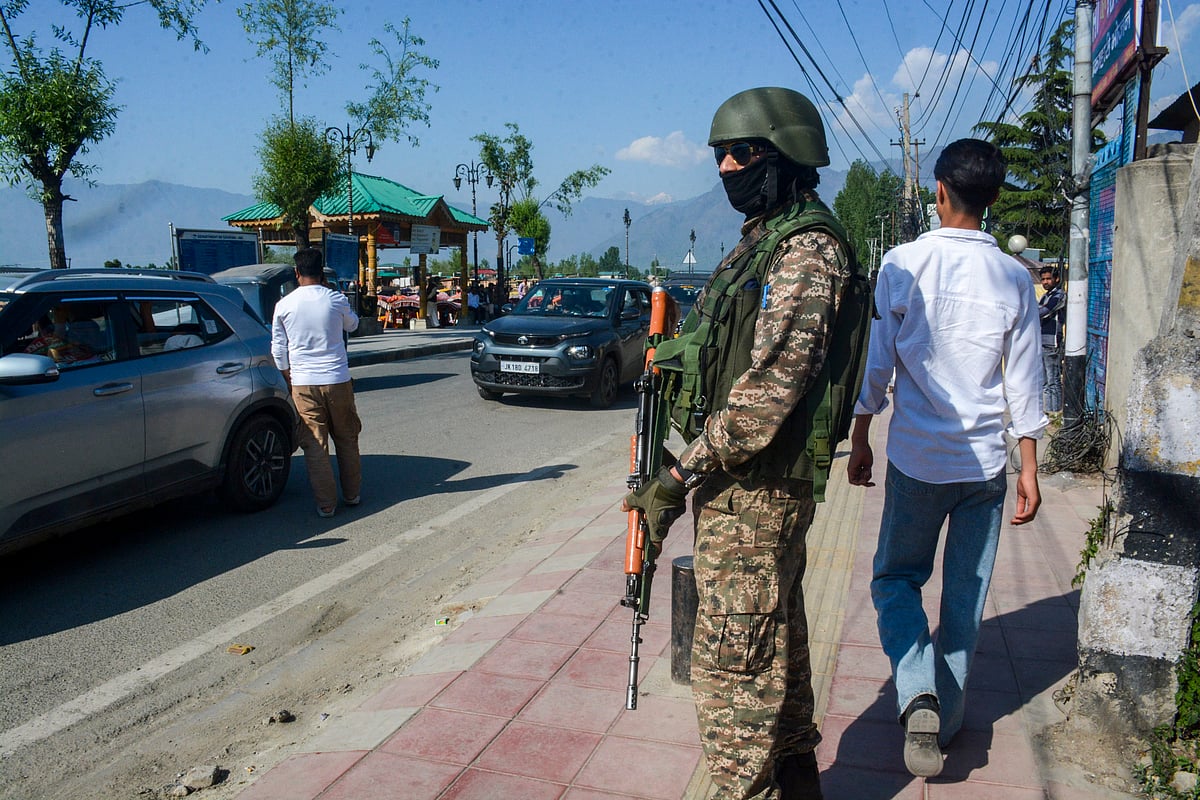 PTI : A security official stands guard at Boulevard Road in the aftermath of the Pahalgam terrorist attack on Sunday, April 27, 2025.