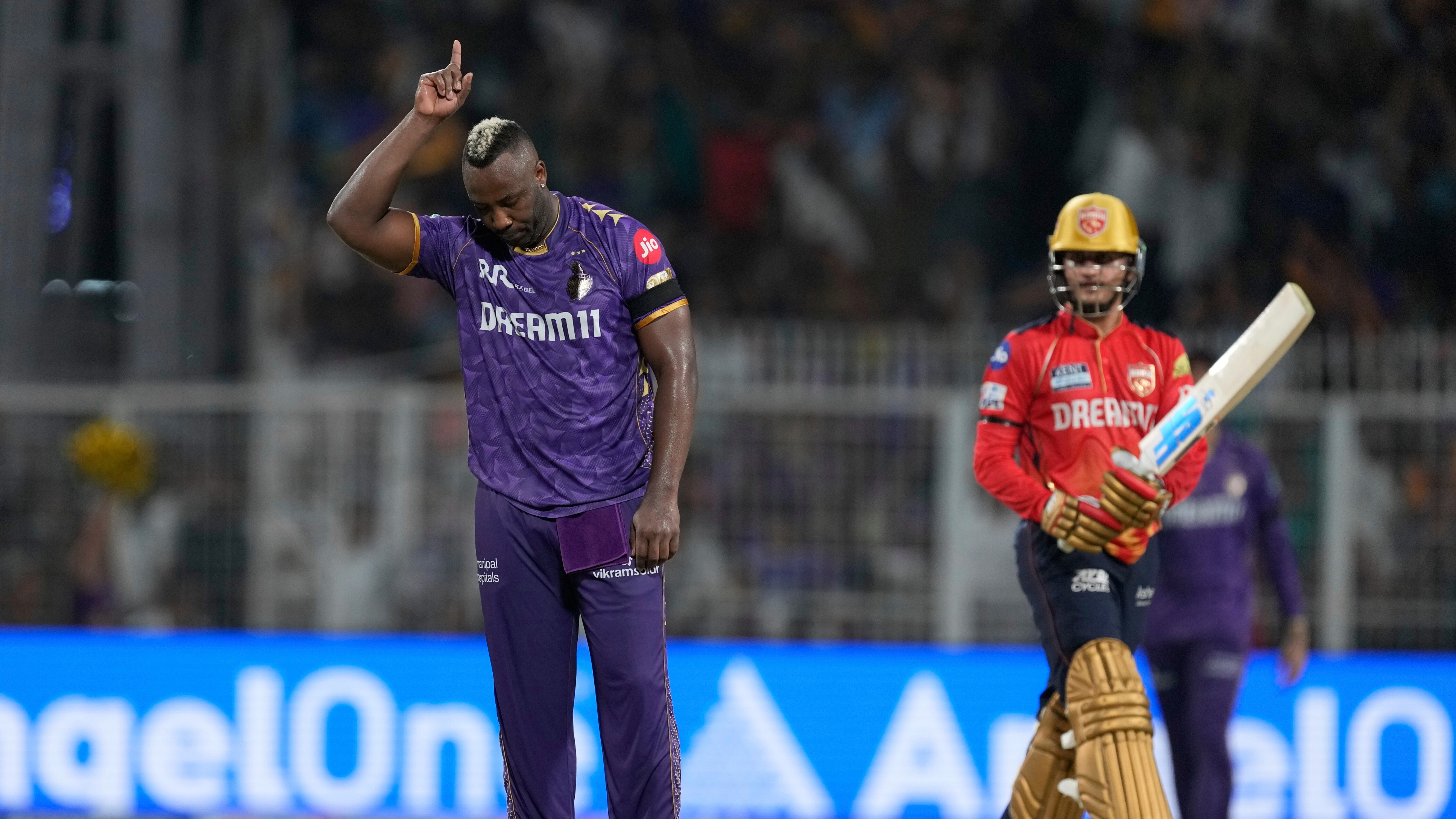 AP Photo/Bikas Das : Kolkata Knight Riders' Andre Russell celebrates the wicket of Punjab Kings' Priyansh Arya at Eden Gardens in Kolkata in Kolkata.