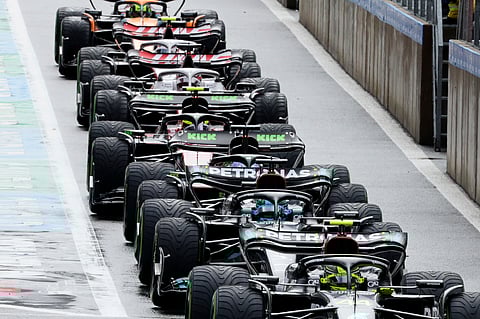 Drivers get ready for the start of the sprint shootout ahead of the Formula One Grand Prix at the Spa-Francorchamps racetrack in Spa, Belgium, on July 29, 2023.
