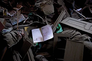 Photo: Manpreet Romana : Collatral Damage: A house next to the house of a suspected militant was damaged during a demolition drive in Murran, Pulwama