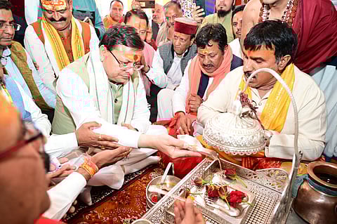 CM Pushkar Singh Dhami performing puja