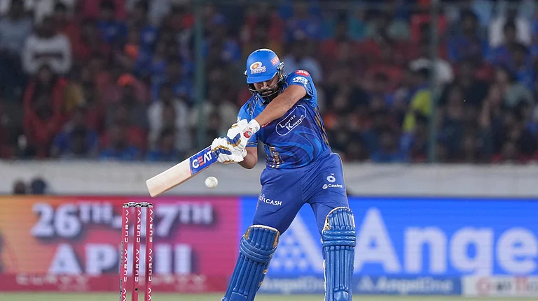 Mumbai Indians' Rohit Sharma plays a shot during the Indian Premier League cricket match between Sunrisers Hyderabad and Mumbai Indians at Rajiv Gandhi International Cricket Stadium in Hyderabad. - AP Photo/Mahesh Kumar A.