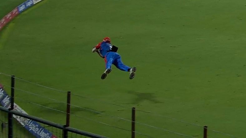 Photo: Screengrab : Delhi Capitals' Dushmantha Chameera catch the ball near the boundary rope to dismiss Anukul Roy in the IPL 2025 in New Delhi.