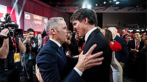 | Photo: AP : Canada PM Mark Carney with former prime minister Justin Trudeau