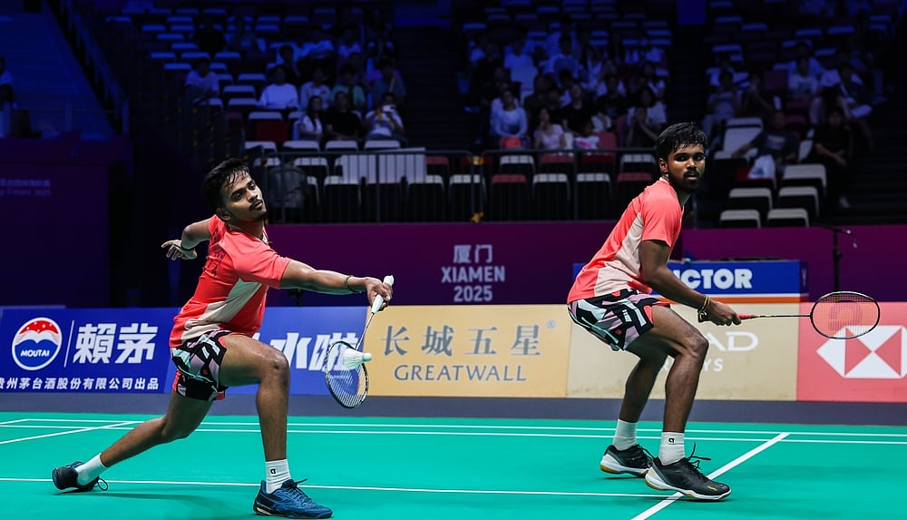 Photo: Badminton Association Of India : Hariharan Amsakarunan (left) & Ruban Kumar Rethinasabapathi (right) in group stage action against England
