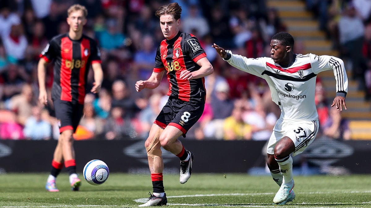 Alex Scott in action against Manchester United