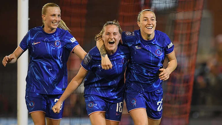 Lucy Bronze celebrates her goal against Manchester United. - null