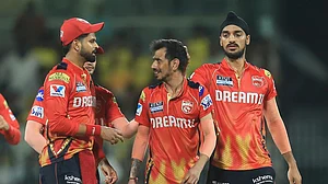 | Photo: AP/R. Parthibhan : Punjab Kings' Yuzvendra Chahal celebrates the dismissal of Chennai Super Kings' Mahendra Singh Dhoni during IPL 2025.