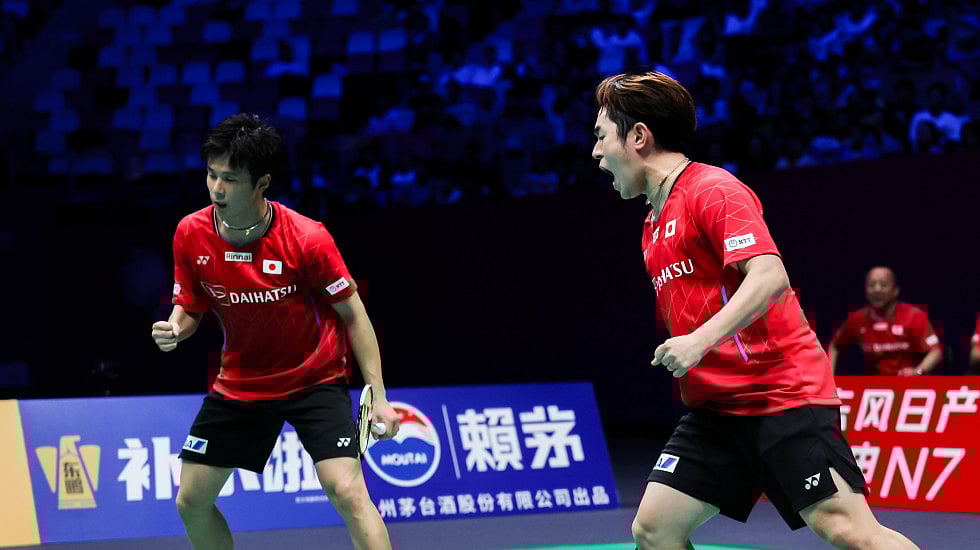Photo: BWF website : Japan's Takuro Hoki and Yugo Kobayashi in action at the BWF Sudirman Cup in Xiamen, China.