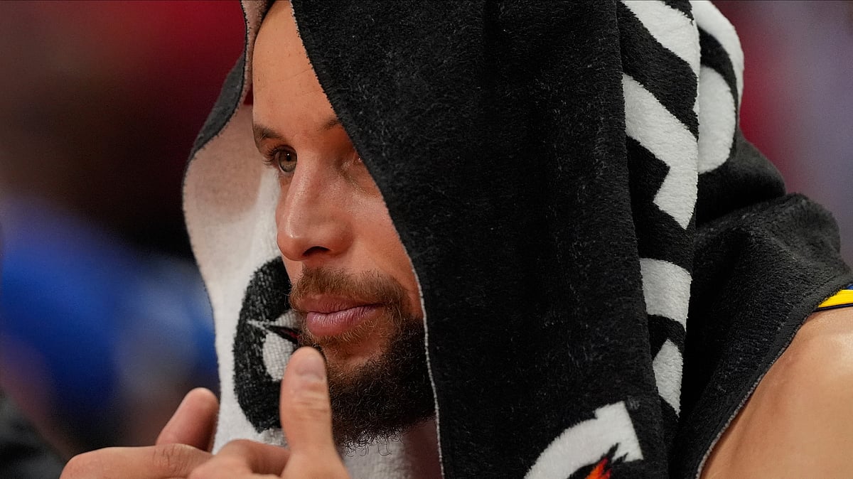 (AP Photo/David J. Phillip)

 : Golden State Warriors guard Stephen Curry watches from the bench during the second half of Game 5 of an NBA basketball first-round playoff series against the Houston Rockets, Wednesday, April 30, 2025, in Houston. 