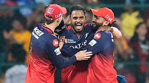 AP Photo/Aijaz Rahi : Royal Challengers Bengaluru's Yash Dayal, centre, celebrates with teammates after their win in the Indian Premier League cricket match against Chennai Super Kings at Chinnaswamy Stadium in Bengaluru.