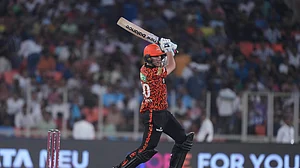 AP Photo/Siddharaj Solanki : Sunrisers Hyderabad's captain Pat Cummins plays a shot during the Indian Premier League cricket match in Ahmedabad.