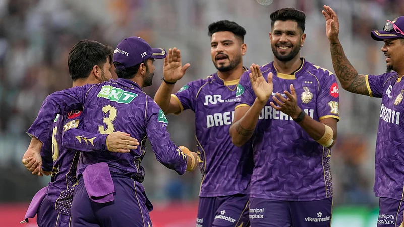 Kolkata Knight Riders captain Ajinkya Rahane, left, celebrates with teammates. AP
