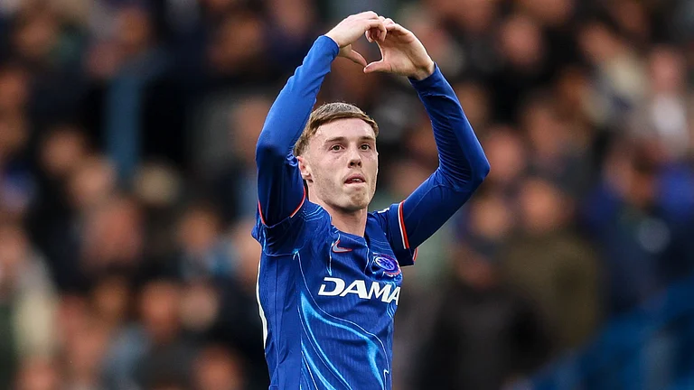 Palmer celebrates after scoring his penalty - null