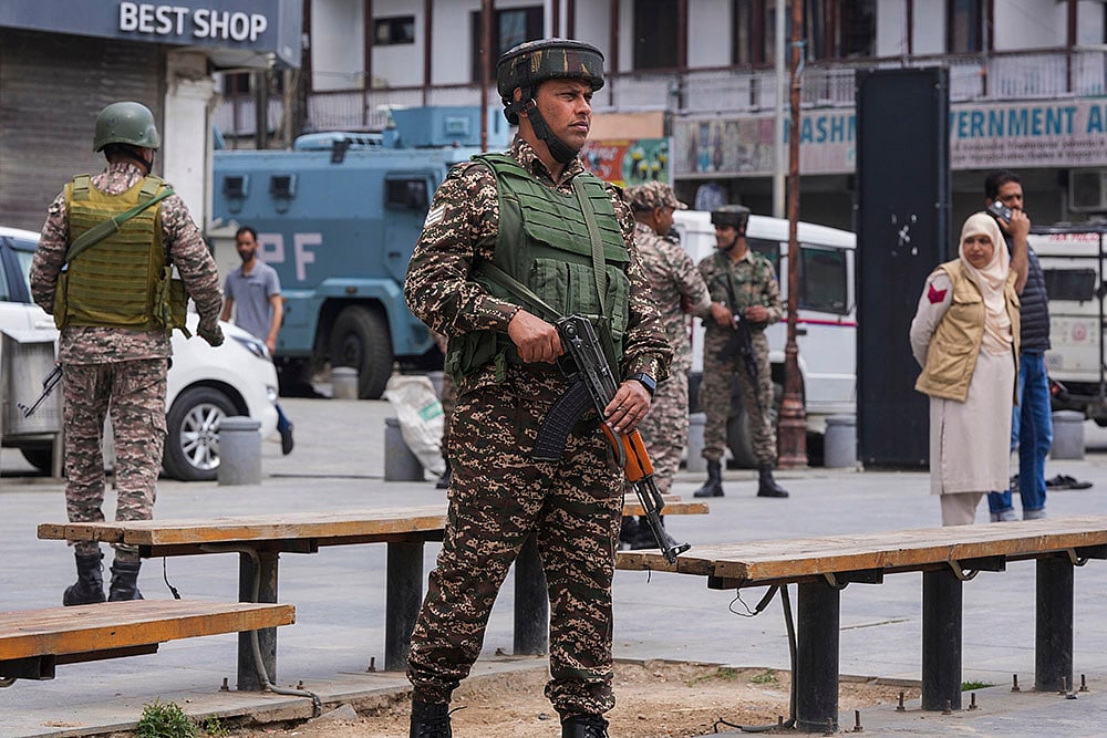 | Photo: PTI/S Irfan : Security in Srinagar