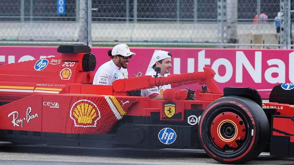 AP/Marta Lavandier : Ferrari Drivers Charles Leclerc and Lewis Hamilton drive together before the Formula One Miami Grand Prix auto race Sunday, May 4, 2025, in Miami Gardens. 