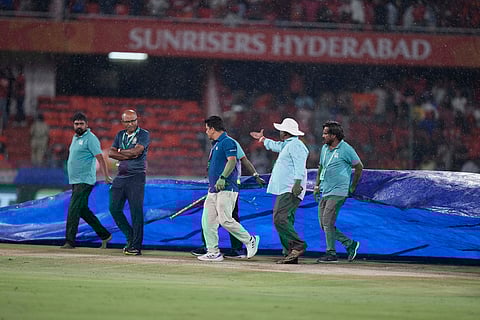 Covers come on at the Rajiv Gandhi International Stadium during the IPL 2025 match between SunRisers Hyderabad and Delhi Capitals.