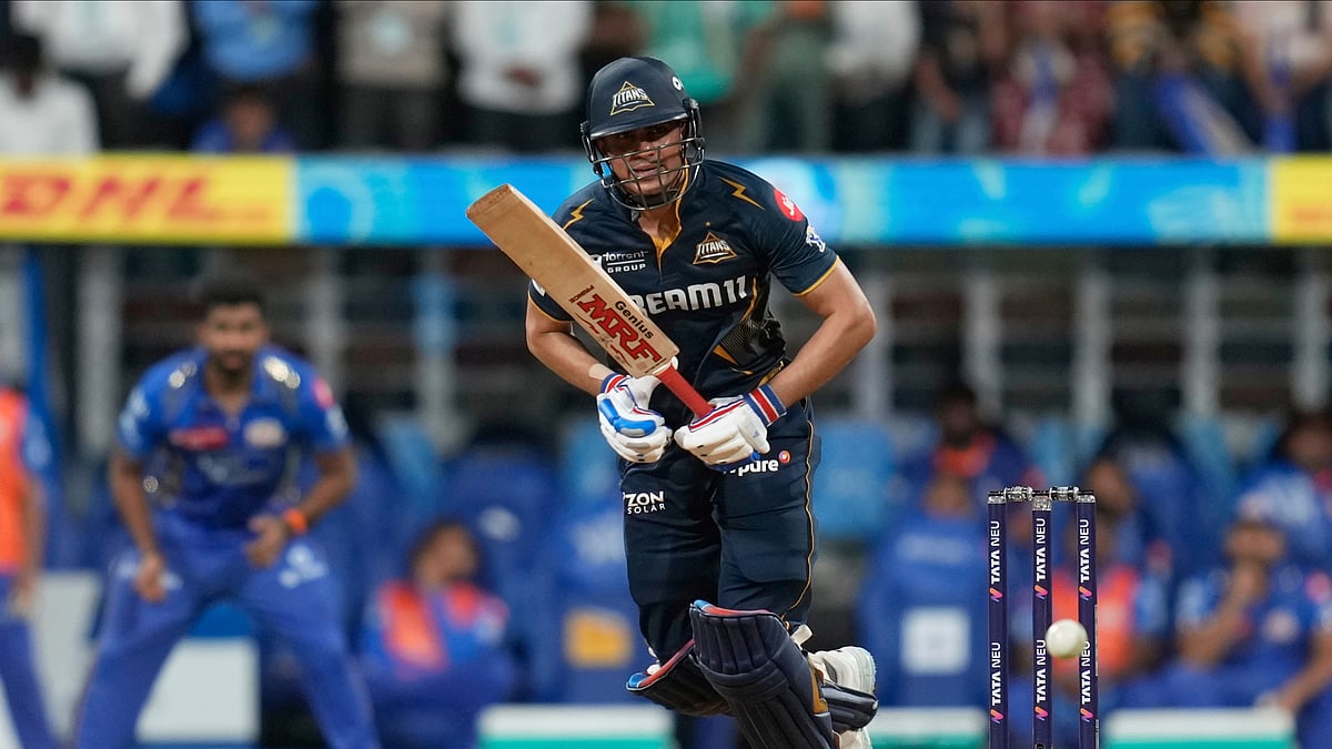 AP Photo/Rajanish Kakade : Gujarat Titans' captain Shubman Gill plays a shot during the Indian Premier League cricket match between Mumbai Indians and Gujarat Titans at Wankhede Stadium in Mumbai.