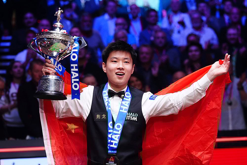 | Photo: Mike Egerton/PA via AP : World Snooker Championship: Zhao Xintong vs Mark Williams