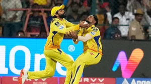AP Photo/Aijaz Rahi : Chennai Super Kings' Ravindra Jadeja, left, and teammate Matheesha Pathirana collide as they run to catch the ball during the Indian Premier League cricket match in Bengaluru.