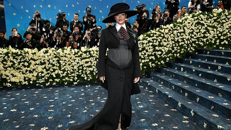Rihanna debuts baby bump on 2025 Met Gala - AP