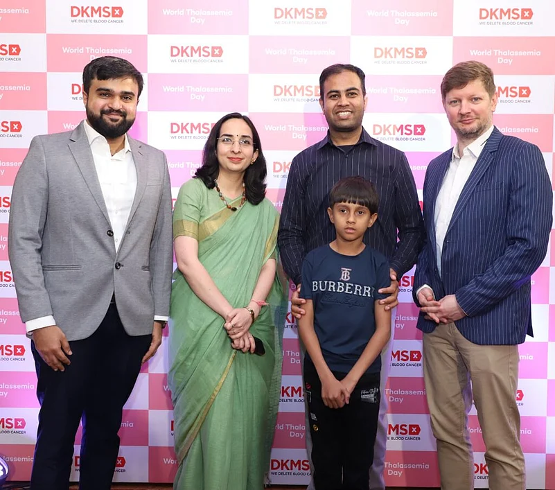 Pratham with his parents