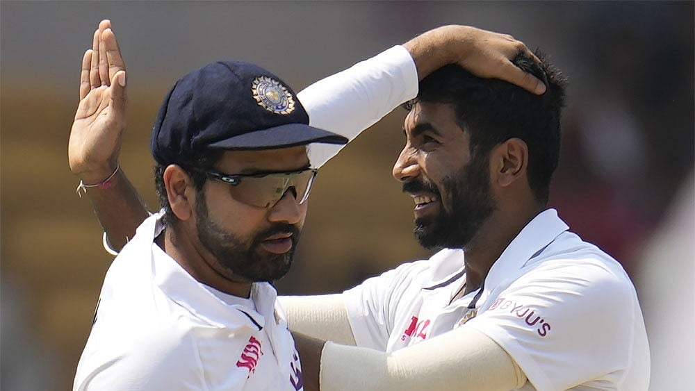 India's former Test captain Rohit Sharma (L) with India's Test vice-captain Jasprit Bumrah. - Photo: AP