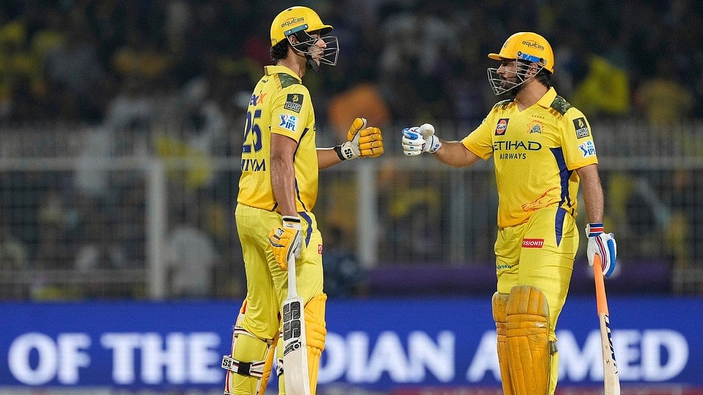 | Photo: AP Photo/Bikas Das : Chennai Super Kings' Shivam Dube celebrates scoring runs with captain Mahendra Singh Dhoni during the IPL 2025 match against Kolkata Knight Riders.