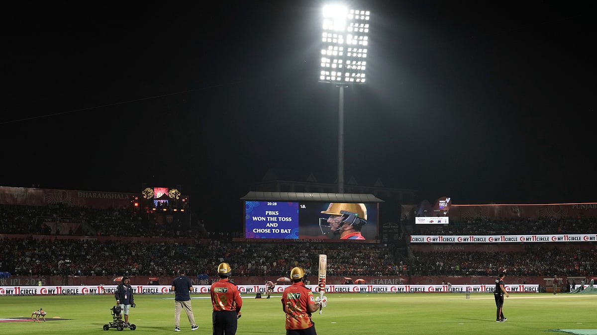 AP Photo/Ashwini Bhatia : Punjab Kings' Priyansh Arya, left, and batting partner Prabhsimran Singh walk onto the field to bat during the Indian Premier League cricket match in Dharamshala.